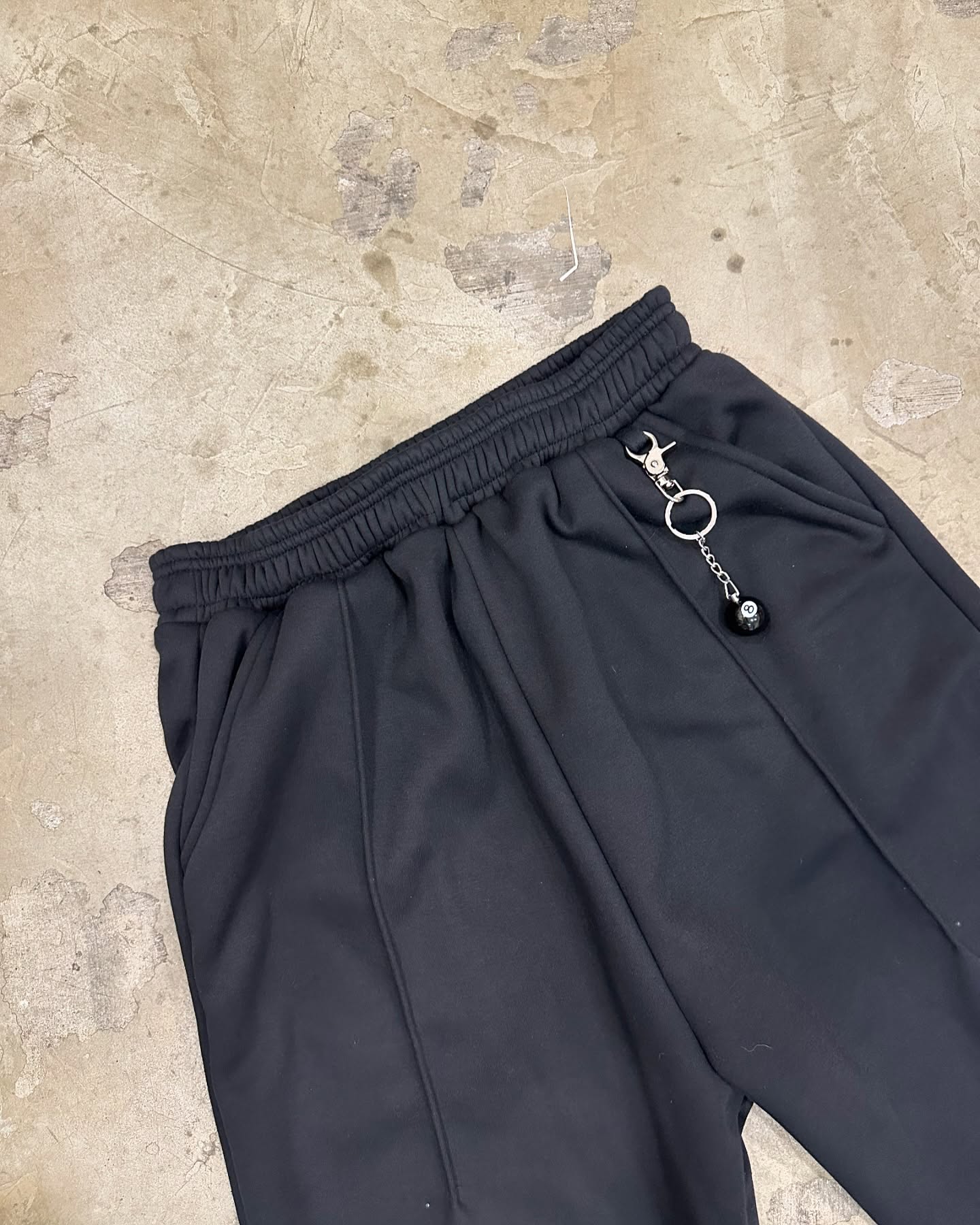 STRAIGHT LEG PLEATED SWEATS - BLACK