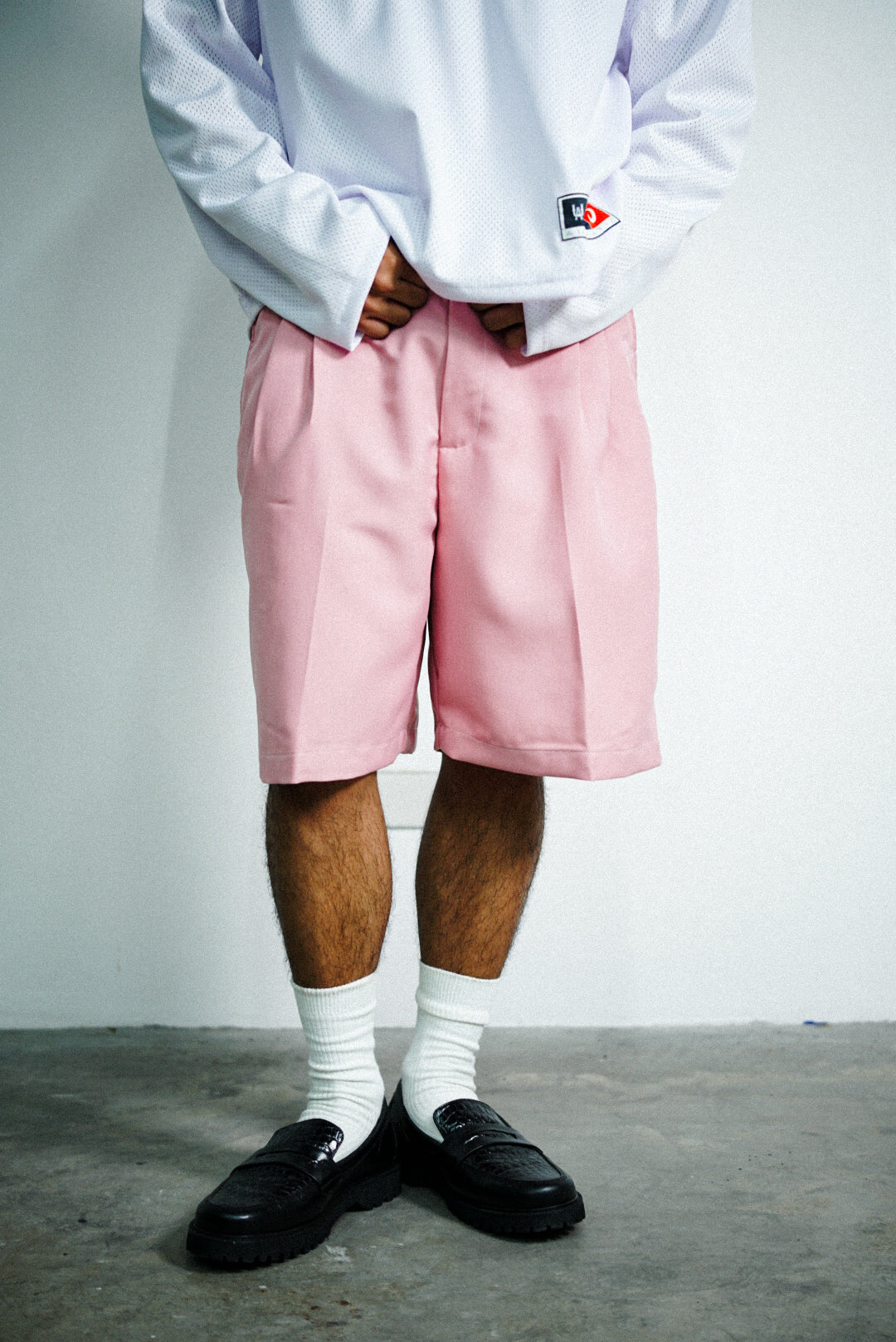 PLEATED SHORTS - CORAL PINK